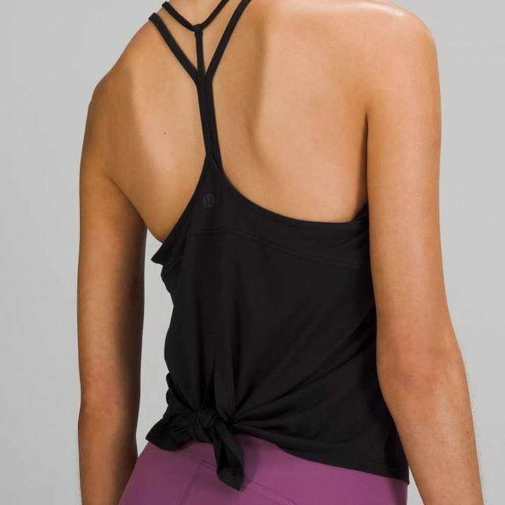 Excellent condition Lululemon Black Tie Open Back Pilates Tank Size: 4